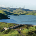 Los Vaqueros Resevoir with rolling hills and wind farm in background